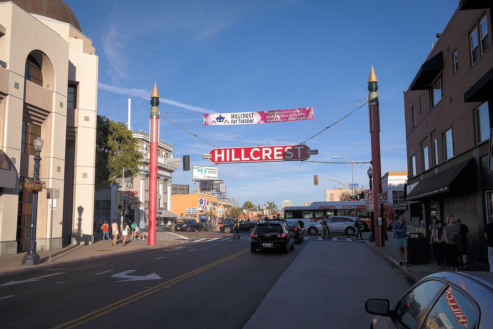 The Hillcrest neighborhood sign arching over University Avenue
